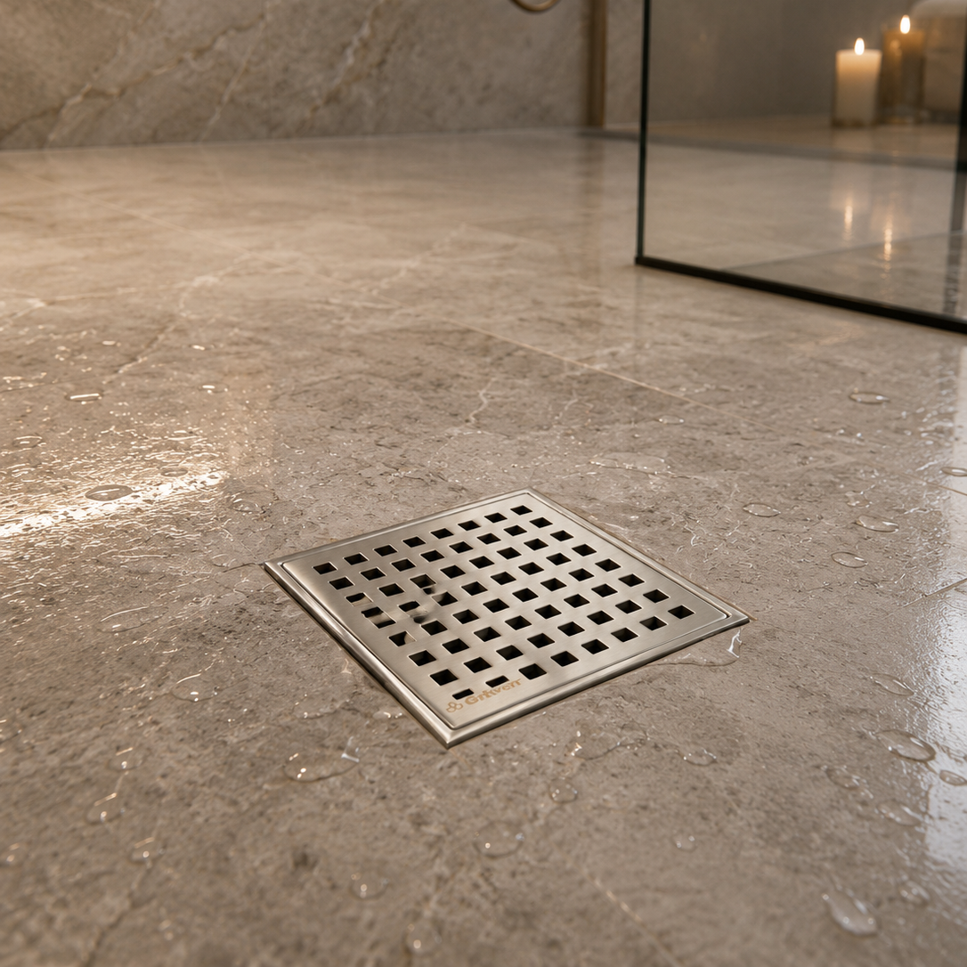 Desagüe para piso cuadrado 4" x 4" perforado en cuadros en acero inoxidable cromado
