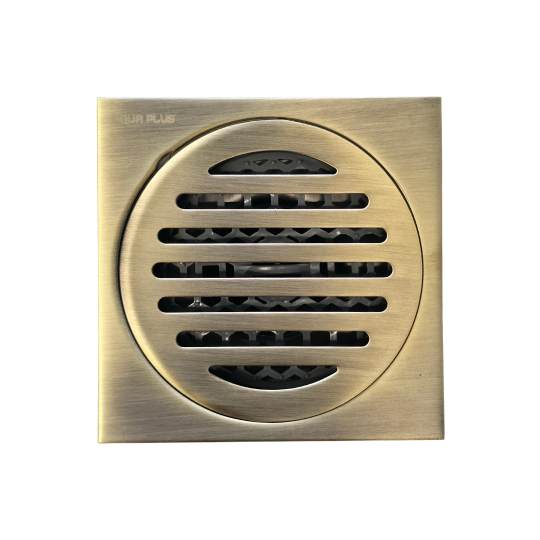 Desagüe para piso cuadrado 4" x 4" con antiolores en acero inoxidable dorado