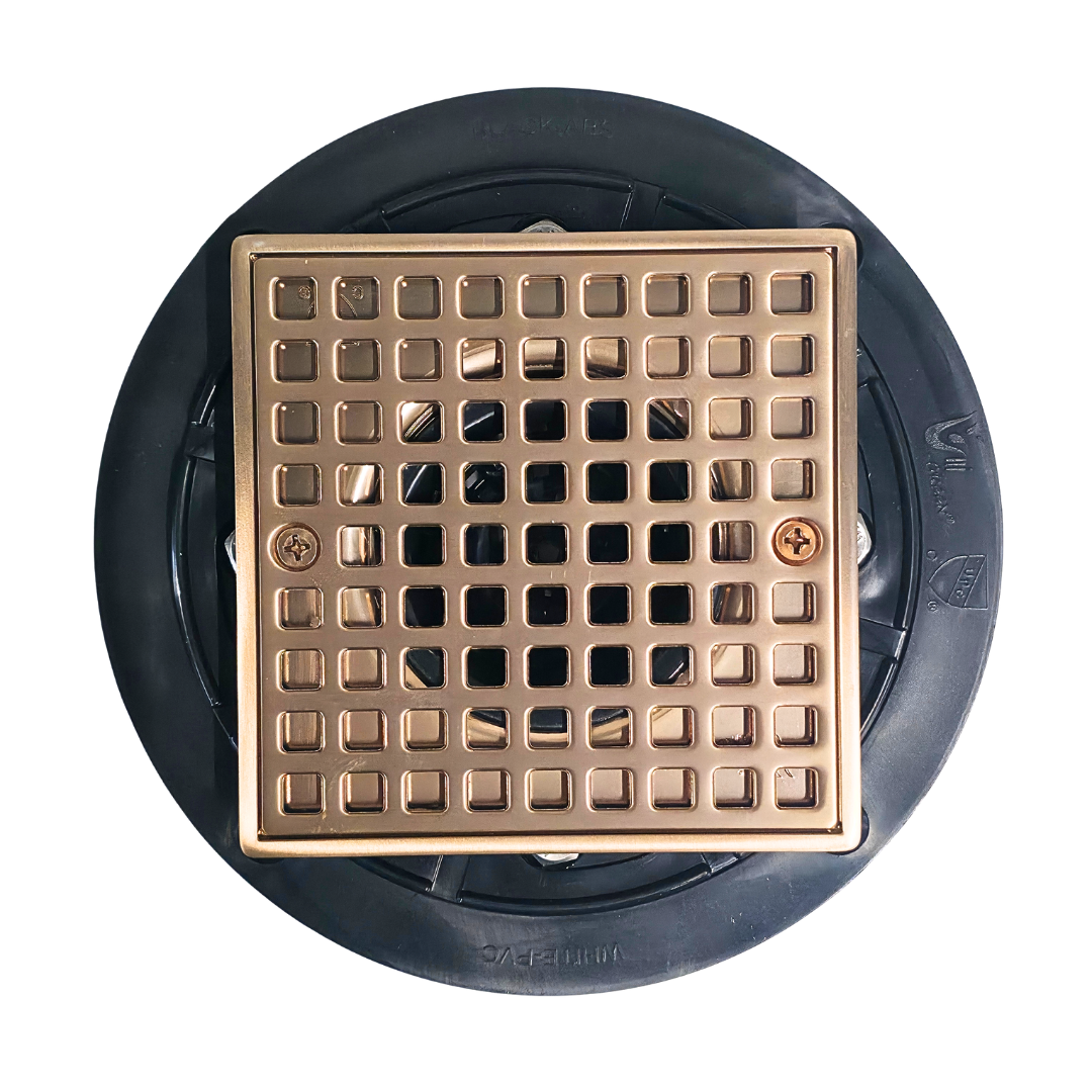 Desagüe para piso cuadrado 4" x 4" con filtro en acero inoxidable dorado